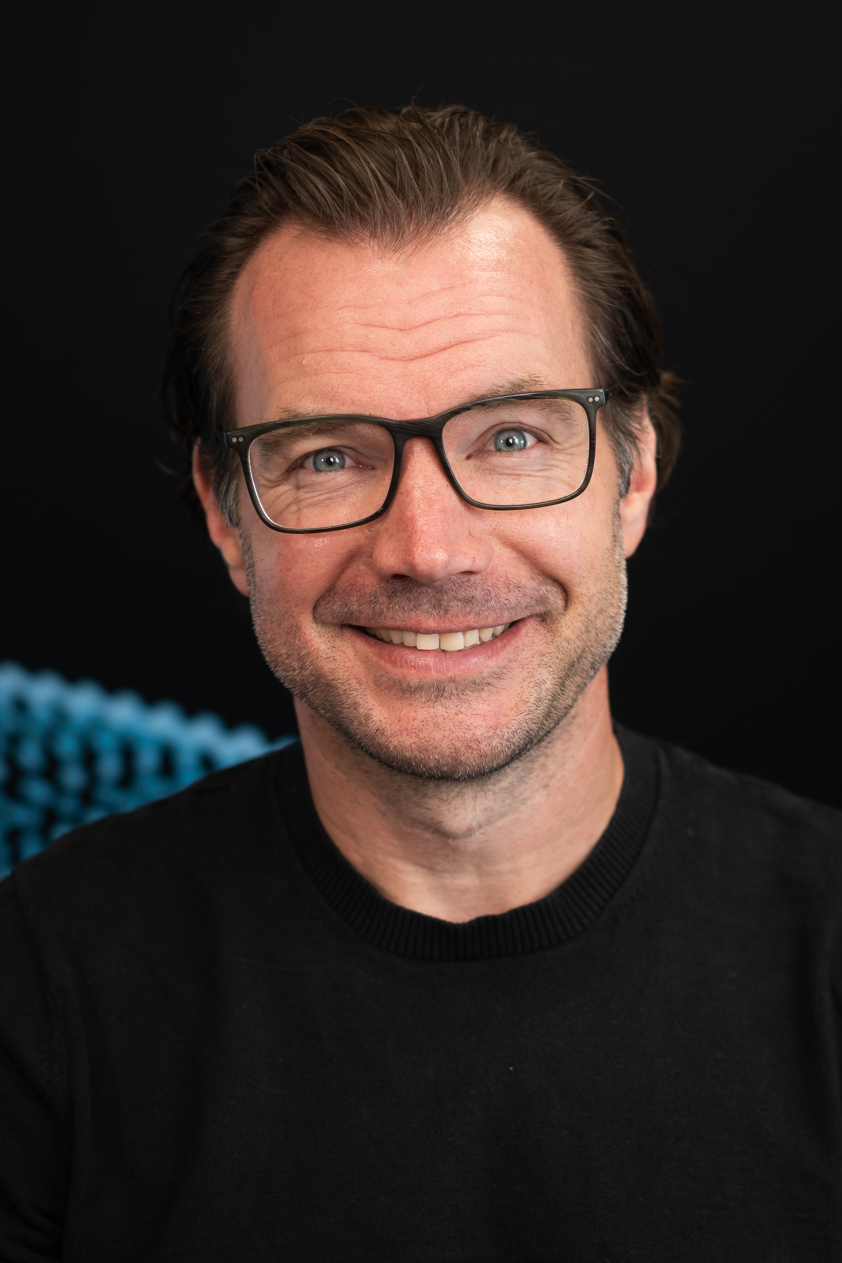 Headshot of Doug Kunnath, Founder of Equinox Audio Visuals